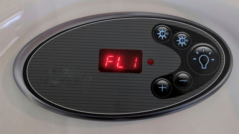 Hot tub control panel displaying an FL1 error code